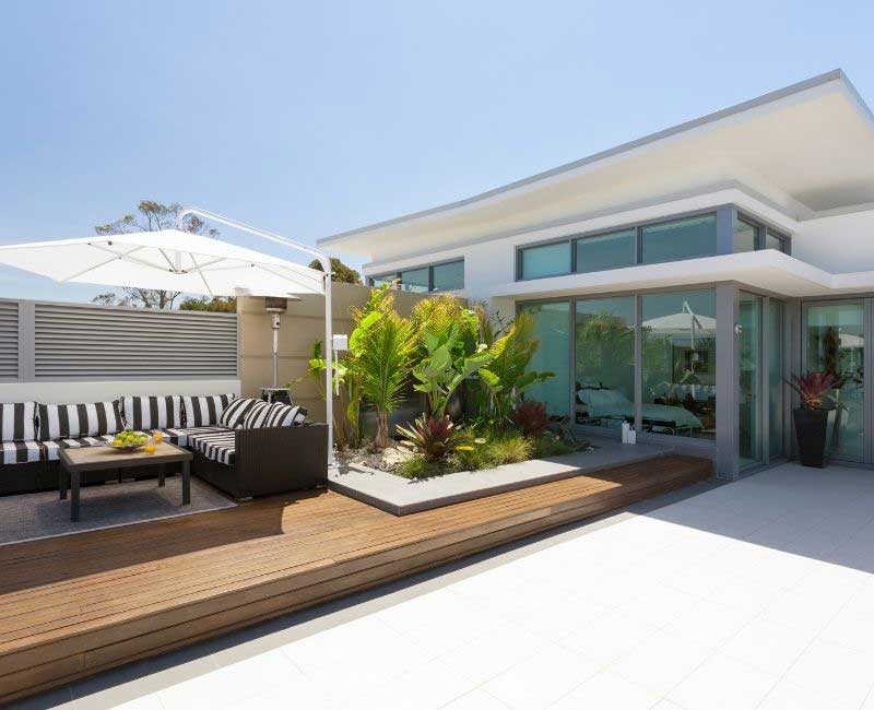 How to transform an outdoor space - decking, tiles, lighting, fresh paint, coordinated furnishings, outdoor kitchens.
